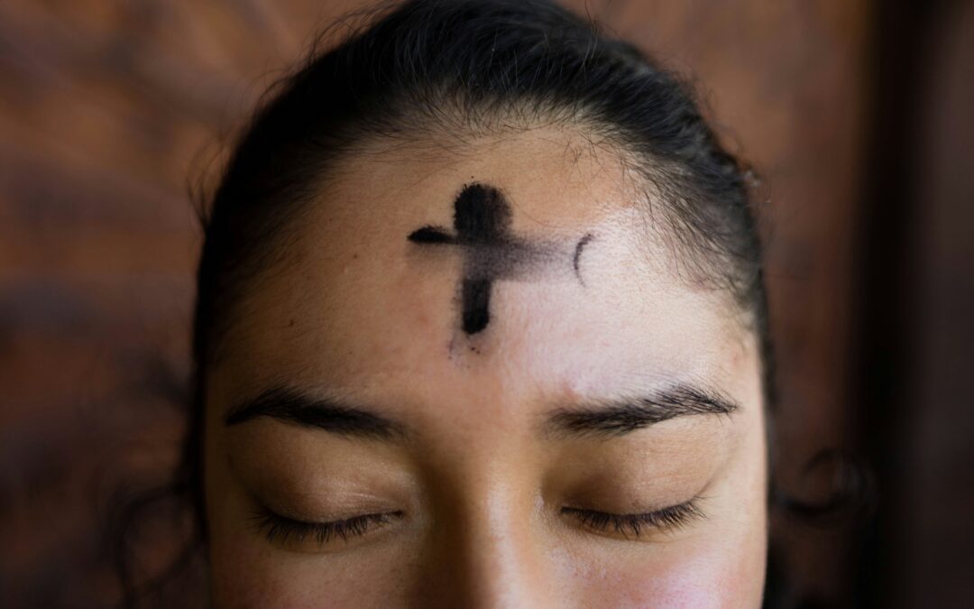 woman with ash cross on forehead